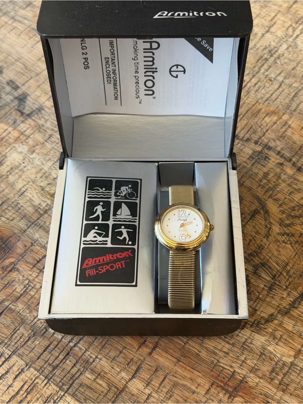 Vintage Armitron "Slinky" Gold Tone Watch 29mm w/ original box and papers - Picture 2 of 7